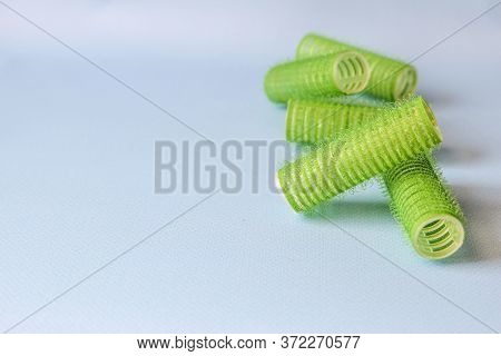 Hair Culers On The Blue Backround. Green Culers For Hairdress.