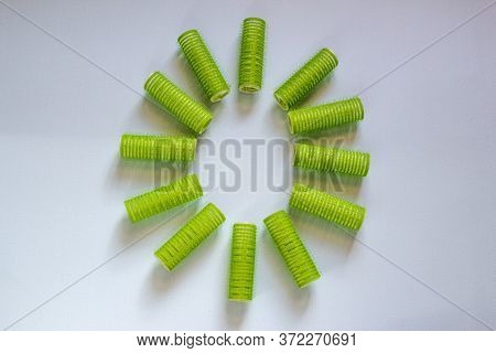 Hair Culers On The Blue Backround. Green Culers For Hairdress.