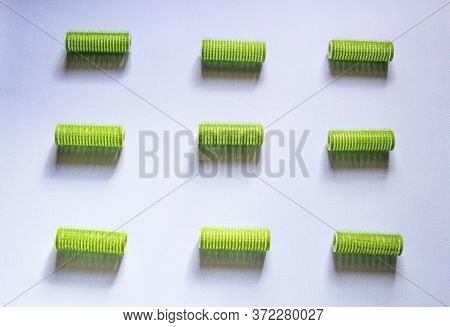 Hair Culers On The Blue Backround. Green Culers For Hairdress.