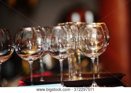 Empty Wine Glasses And Tray Close Up