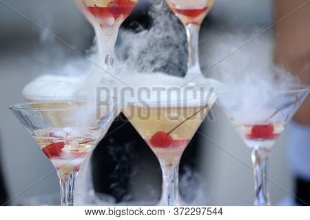 Pyramid Of Glasses With A Champagne Close Up.