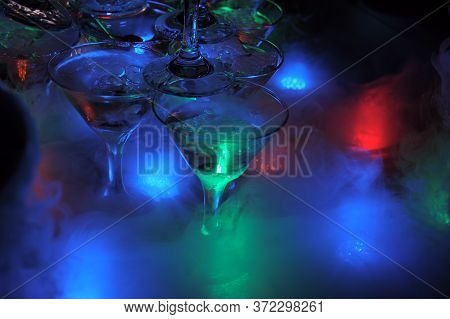 Pyramid Of Glasses With Light.