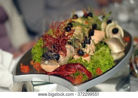 Stuffed Pike With Vegetables And Herbs. Hearty Dish In One Of The Bars.