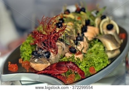 Stuffed Pike With Vegetables And Herbs. Hearty Dish In One Of The Bars.