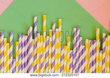Drinking Straws For Party On Colorful Background. Top View Of Colorful Paper Disposable Eco-friendly