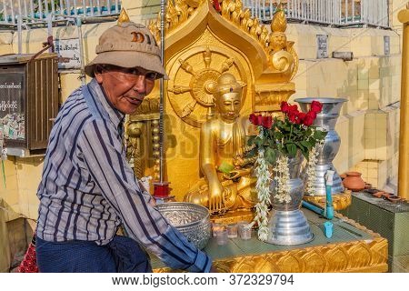 Yangon, Myanmar - December 15, 2016: Local Man At Botataung Paya Pagoda In Yangon, Maynmar