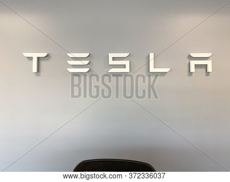 Tampa, Fl/usa-5/31/20: The Tesla Sign At The Entrance Of The Tesla Dealership In Tampa, Fl.  Tesla, 