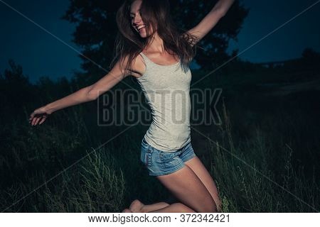 Mobile Photo Imitation Of The Young Lady Dancing Extatic In The Dark