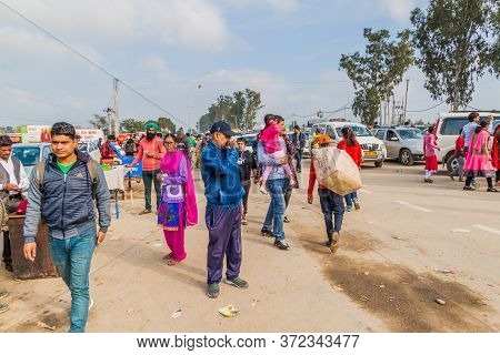 Wagah, India - January 26, 2017: People Walk To The Border To Watch The Military Ceremony At India-p