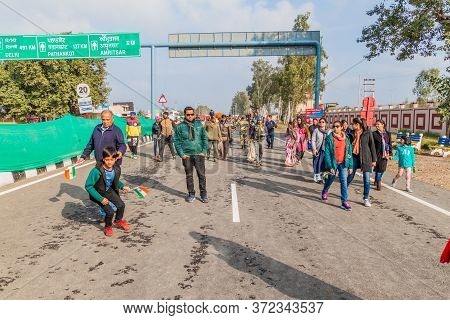 Wagah, India - January 26, 2017: People Walk To The Border To Watch The Military Ceremony At India-p