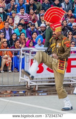 Wagah, India - January 26, 2017: Border Guard Watched By Indian Spectators At The Military Ceremony 