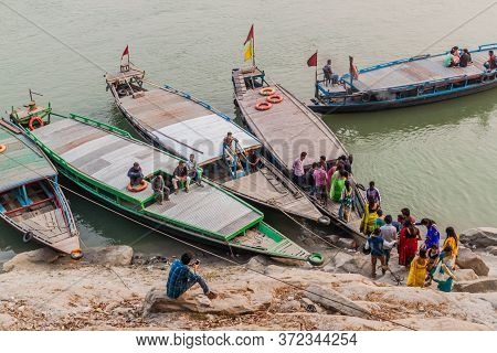 Guwahati, India - January 31, 2017: People Boarding A Boat At Peacock Umananda Island In Brahmaputra
