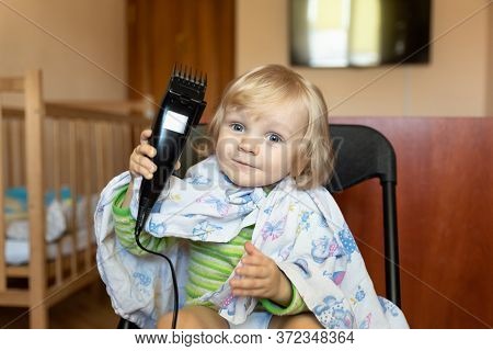 The Kid Makes A Haircut With A Tremmer On His Own On Self-isolation