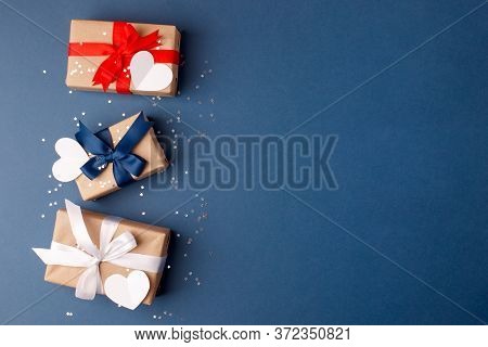 Red, Blue And White Gift Boxes And White Heart On Classic Blue Background In The National Colors Of 