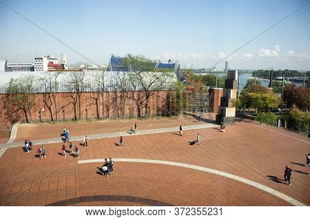 German People And Foreign Traveler Walking Travel Visit On Patio Of Rhine Garden Or Rheingarten Near