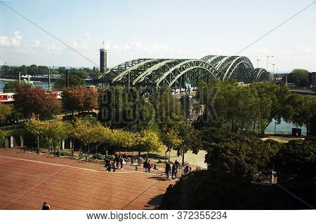 View Landscape And Cityscape Of Koln City And Rhine Garden Or Rheingarten And Rhine River At Hohenzo
