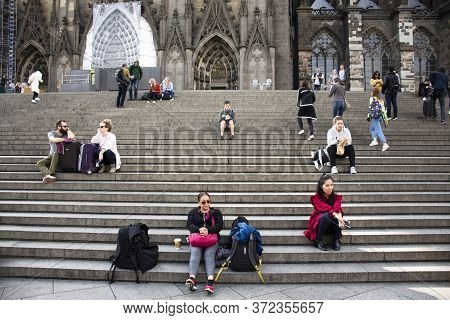 German People And Foreign Travelers Travel Visit And Respect Praying God At Cologne Cathedral Or Hoh