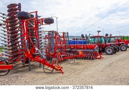 Kyiv, Ukraine - June 16, 2020: Tractor And Unia Cultivator On The Land For Minimum-tillage Technolog