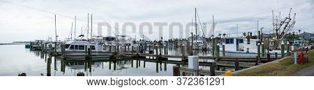 Boatyard, With Fishing Boats In The Gulf Of Mexico At Fulton, Texas, Usa