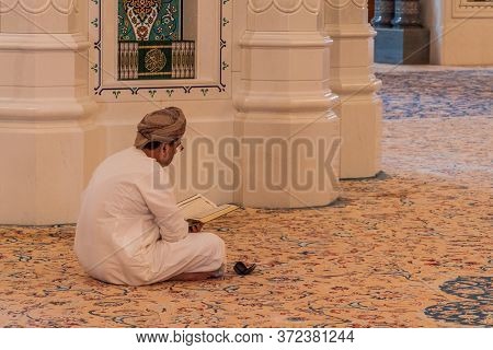Muscat, Oman - February 22, 2017: Local Man In Sultan Qaboos Grand Mosque In Muscat, Oman
