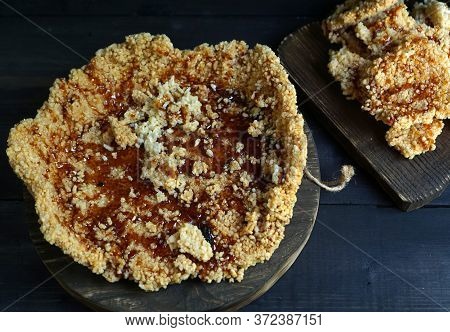 In Indonesia, Especially Central Java, Scorched Rice Or  Rice Cracker Is Called Intip.