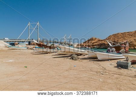 Fishing Boats In Sur, Oman. Khor Al Batar Bridge In The Background.