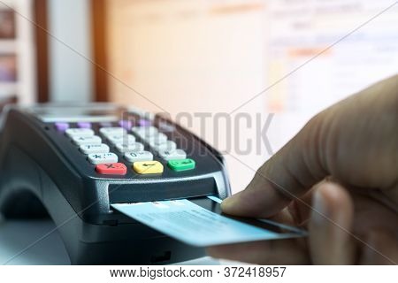 Insert Credit Card Pos Terminal Machine,closeup Paying By Credit Cards In Café. Focus On Man Hands I