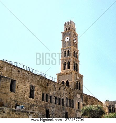 Ancient Clock Tower In A Small Fishing Town