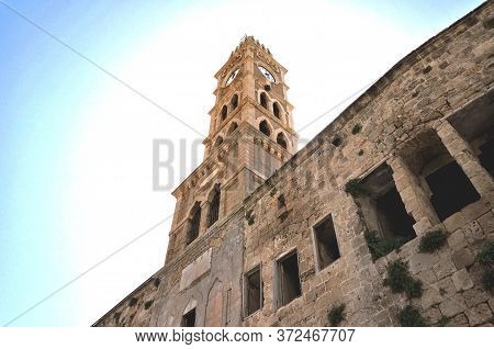 Ancient Clock Tower In A Small Fishing Town