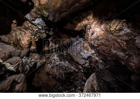 Inside The Mysterious Flowstone Cave 'nebelhöhle' With Stalagmites And Stalactites In Germany.