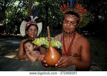 Porto Seguro, Bahia / Brazil - August 4, 2008: Pataxo Indigenous People Are Seen Together With A Pet