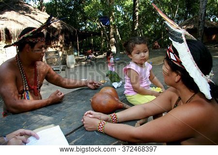 Porto Seguro, Bahia / Brazil - August 4, 2008: Pataxo Indigenous People Are Seen Together With A Pet