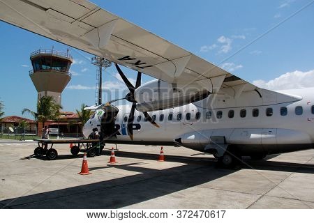 Porto Seguro, Bahia / Brazil - October 10, 2012: Passengers Are Seen During Boarding The Atr-72 Airc