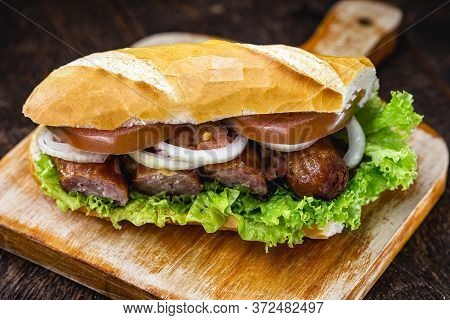 Bread With Pork. Traditional Snack From Brazil.
