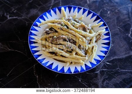 Homemade Trofie Pasta With Delicious Mushrooms And Ricotta