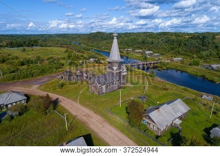 Ancient Wooden Church Of Elijah The Prophet In A Rural Landscape On A Sunny August Day (aerial Photo