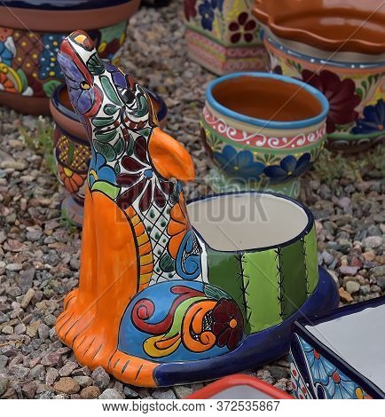 Hand Made And Painted Colored Pottery For Sale At Local Street Market