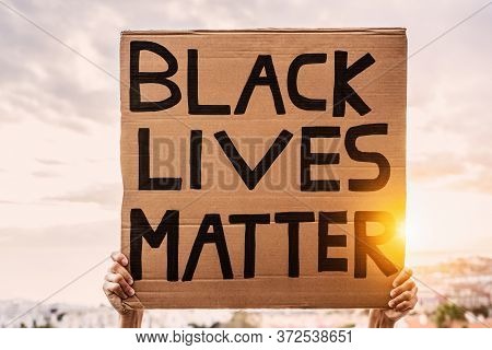 Black Lives Matter Banner - Activist Movement Protesting Against Racism And Fighting For Equality - 