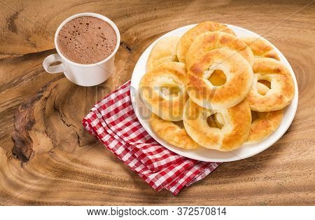 Pandequeso Traditional Colombian Food - Hot Drink Chocolate.