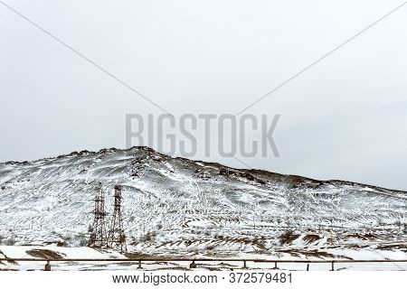 View Of A Snow-covered Dump In The Town Of Karabash