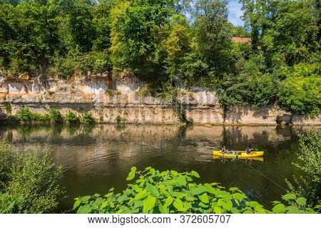 Saint-Leon-sur-Vezere, Dordogne, France - August 13, 2019: Canoeing on the river Dordogne at Saint-Leon-sur-Vezere. France