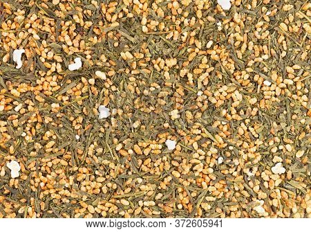 Japanese Green Tea Genmaicha. Tea Leaves With Roasted Brown Rice. Organic Tea Background. Top View. 