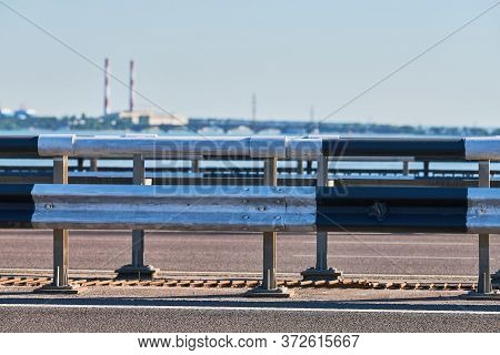 Traffic Barrier On Bridge Highway Road. Median Crash Barriers For Protect Vehicles From Accident. Bl