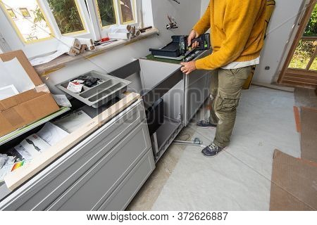Paris, France - Jun 8, 2020: Male Carpenter Worker Holding In Hand Cordless Drill T 18 Plus 3 C 3, 1