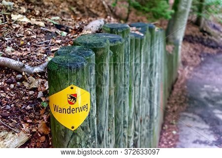 Standard Hiking Trail Marker On A Forest Path In Bern, Switzerland