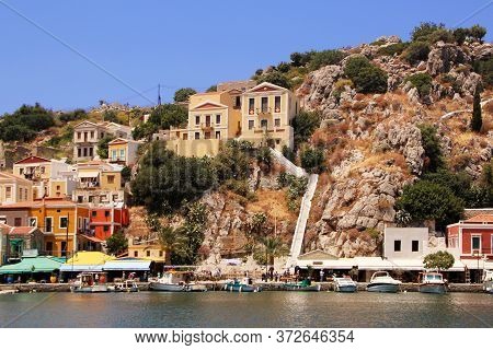 Symi, Greece - June 21, 2020: Symi Town, Symi Island, Pictorial View Of Colorful Houses And  Yialos 