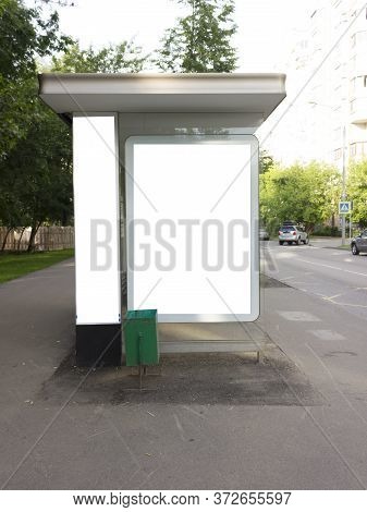 Advertising At A Bus Stop During The Day Mockup.