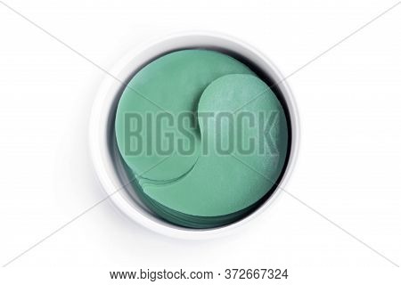 . Cosmetic Hydrogel Patches For Moisturizing And Nourishing The Skin Around The Eyes On A Light Back