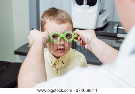 Trial Frame. Glasses Prescription For A Child. Childs Hypermetropy.