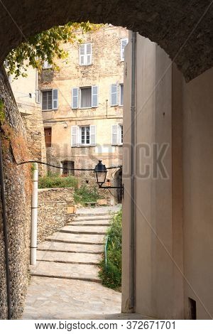 Looking through Little lane French village Casinca